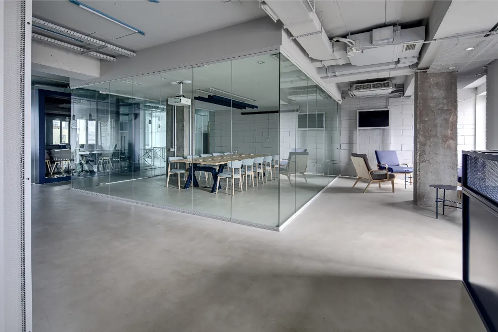 Office partitions | Modern glass partitions in an office space.